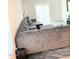 Spacious living room featuring a large sectional sofa and modern flooring at 159 Bywood Dr, Roxboro, NC 27573