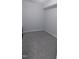 Small carpeted room features neutral walls and trim, with a window at 203 Broomgrove Way, Wake Forest, NC 27587