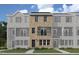 Attractive new construction townhome with a brick exterior and a private balcony at 203 Broomgrove Way, Wake Forest, NC 27587