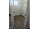 Walk-in pantry with ample shelving and a window for natural light at 203 Broomgrove Way, Wake Forest, NC 27587