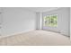 Bright bedroom with large window providing natural light at 2094 Harris Farm Ct, Burlington, NC 27215
