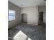 Bright room featuring a niche, ready for new flooring, paint, and your unique design ideas to transform the space at 210 N Driver St, Durham, NC 27703