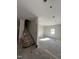 Spacious living room under renovation, with a stairway, offering a blank canvas for your dream interior design at 210 N Driver St, Durham, NC 27703