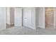 Carpeted bedroom with ensuite bathroom and walk-in closet at 2117 Treelight Way, Wendell, NC 27591