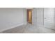 Bedroom with a double door and a view through to the hallway at 2117 Treelight Way, Wendell, NC 27591