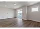 Open living space with recessed lighting and access to a balcony, perfect for relaxing at 2117 Treelight Way, Wendell, NC 27591