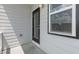 Cozy patio area with an exterior door and window for natural light at 2117 Treelight Way, Wendell, NC 27591