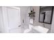 Clean bathroom with floating shelves and walk-in shower at 2417 Bivins Rd, Durham, NC 27712