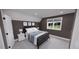 Upstairs bedroom with window and double doors at 2417 Bivins Rd, Durham, NC 27712