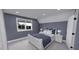 Upstairs bedroom with window and white dresser at 2417 Bivins Rd, Durham, NC 27712