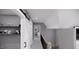 Upstairs hallway with barn door and railing at 2417 Bivins Rd, Durham, NC 27712