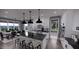 Modern kitchen with stainless steel appliances and an eat-in area at 2417 Bivins Rd, Durham, NC 27712