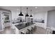 Bright kitchen featuring an expansive island and stainless steel appliances at 2417 Bivins Rd, Durham, NC 27712