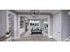 Spacious living room with a stone fireplace and access to backyard at 2417 Bivins Rd, Durham, NC 27712