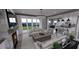 Open living area with stone fireplace, kitchen island, and access to the outdoors at 2417 Bivins Rd, Durham, NC 27712