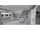 Cozy loft area with seating and large windows at 2417 Bivins Rd, Durham, NC 27712