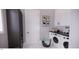 Modern laundry room with washer, dryer, and ample counter space at 2423 Bivins Rd, Durham, NC 27712