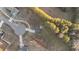 Bird's-eye view of the house, driveway, and surrounding landscape at 263 Langdon Chase Way, Selma, NC 27576