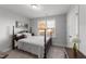 Spacious bedroom with a comfortable bed and plenty of natural light at 263 Langdon Chase Way, Selma, NC 27576