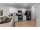 Spacious kitchen featuring stainless steel appliances and granite countertops at 263 Langdon Chase Way, Selma, NC 27576