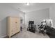 Charming home office featuring a comfortable chair and storage solutions at 263 Langdon Chase Way, Selma, NC 27576