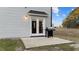 Private patio with french doors and gas grill at 263 Langdon Chase Way, Selma, NC 27576