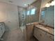 Beautiful bathroom features granite countertops, modern shower, and neutral color palette at 46 Steppe Way, Garner, NC 27529