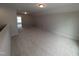 Expansive bonus room with neutral carpet, recessed lighting, and versatile living space at 46 Steppe Way, Garner, NC 27529