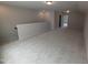 A large, carpeted bonus room offers versatile space for recreation and relaxation at 46 Steppe Way, Garner, NC 27529