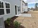 Backyard with patio and adjacent townhomes at 4937 S Trout Crest, Raleigh, NC 27604