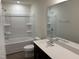 Bathroom with tub, shower, and double vanity at 4937 S Trout Crest, Raleigh, NC 27604