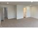 Large bedroom with two doors and carpet at 4937 S Trout Crest, Raleigh, NC 27604
