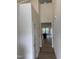 Bright entryway with hardwood floors and view into the living area at 4937 S Trout Crest, Raleigh, NC 27604