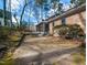 Exterior view of backyard featuring patio and a basketball hoop at 501 Queensferry Rd, Cary, NC 27511