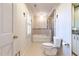 Traditional bathroom featuring a soaking tub, separate shower, and elegant fixtures at 501 Queensferry Rd, Cary, NC 27511