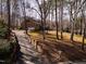 Brick house featuring a long driveway surrounded by trees at 501 Queensferry Rd, Cary, NC 27511
