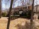 Front exterior of traditional brick home featuring a manicured lawn at 501 Queensferry Rd, Cary, NC 27511