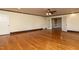 Inviting living room with hardwood floors and an open doorway to another room at 501 Queensferry Rd, Cary, NC 27511