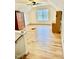 Large bonus room with hardwood floors, ceiling fan, and abundant natural light at 59 Mar-Joy Dr, Dunn, NC 28334