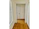 Bright hallway with hardwood floors and neutral walls at 59 Mar-Joy Dr, Dunn, NC 28334