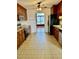 Kitchen with wood cabinets, stainless steel appliances, and tile floor at 59 Mar-Joy Dr, Dunn, NC 28334
