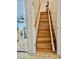 Staircase with chair lift providing accessibility to upper levels at 59 Mar-Joy Dr, Dunn, NC 28334