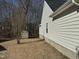 Backyard with shed and wooded area at 6020 Newhall Rd, Durham, NC 27713