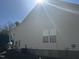 Rear of house, showcasing vinyl siding and AC unit at 6020 Newhall Rd, Durham, NC 27713