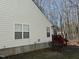 House exterior with vinyl siding and a wooden deck at 6020 Newhall Rd, Durham, NC 27713