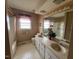Bright bathroom with a double vanity and large mirror at 8110 Nc 210 N, Angier, NC 27501
