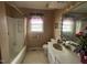 Clean bathroom with a tub shower combo and vanity at 8110 Nc 210 N, Angier, NC 27501