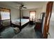 Cozy bedroom with a four-poster bed and ample floor space at 8110 Nc 210 N, Angier, NC 27501