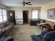 Spacious living room featuring ample seating and large windows at 8110 Nc 210 N, Angier, NC 27501