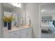 Clean bathroom with modern vanity and a large mirror at 8805 Melvin St # 35, Willow Springs, NC 27592